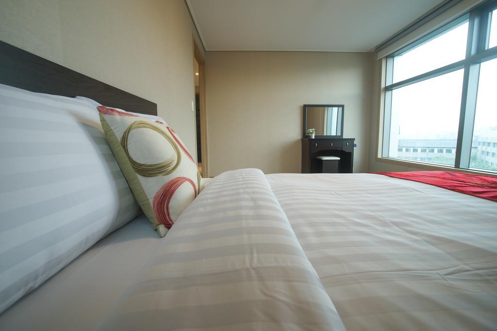 R&T Hotel Чеджудо Номер фото